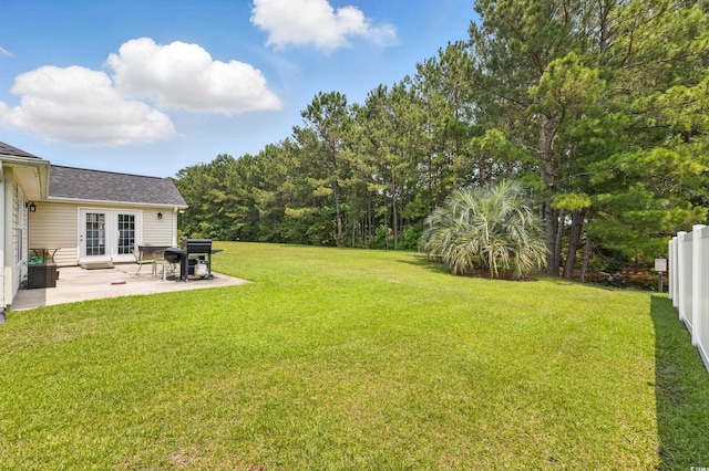 137 Maiden Ln, Myrtle Beach, SC 29588 - view of grassy yard featuring a patio