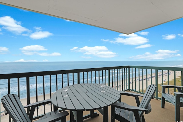 201 S Ocean Blvd Unit 1106, North Myrtle Beach, SC 29582 - balcony featuring view of water and beach and outdoor dining space