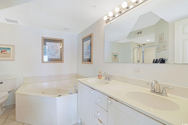 201 S Ocean Blvd Unit 1106, North Myrtle Beach, SC 29582 - bathroom featuring a whirlpool tub, double vanity, a shower stall, tile patterned floors, and a textured ceiling