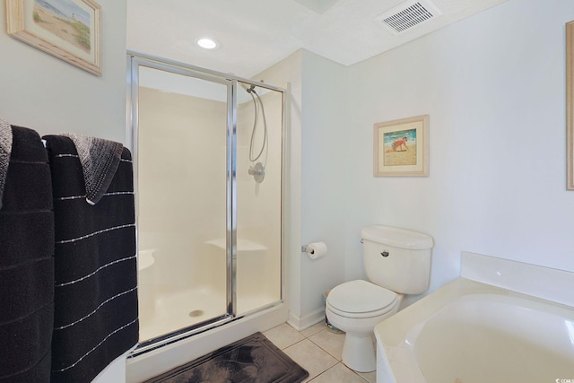 201 S Ocean Blvd Unit 1106, North Myrtle Beach, SC 29582 - bathroom with tile patterned floors, a stall shower, and a garden tub