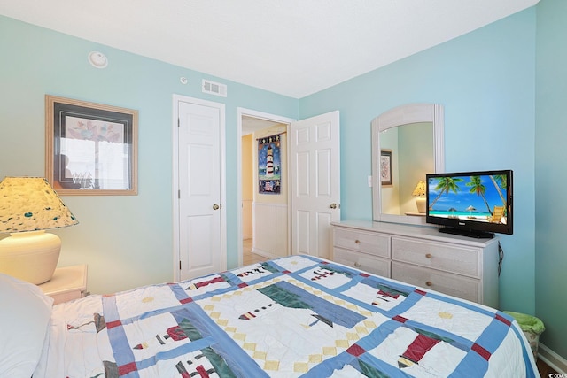 201 S Ocean Blvd Unit 1106, North Myrtle Beach, SC 29582 - bedroom featuring baseboards