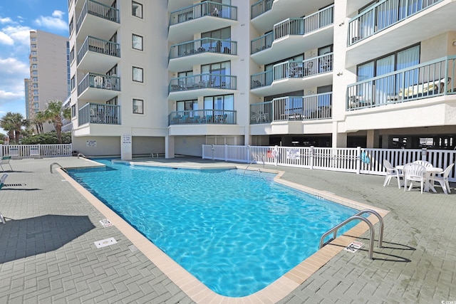 201 S Ocean Blvd Unit 1106, North Myrtle Beach, SC 29582 - community pool featuring a patio area