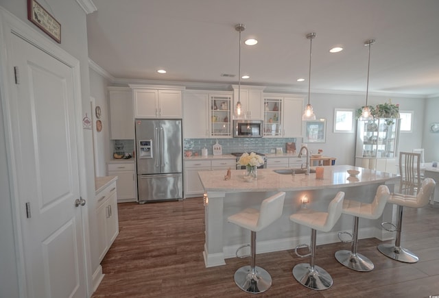 148 Splendor Cir, Murrells Inlet, SC 29576 - kitchen with stainless steel appliances, white cabinets, dark wood finished floors, ornamental molding, and recessed lighting