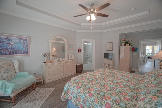 148 Splendor Cir, Murrells Inlet, SC 29576 - bedroom featuring a raised ceiling, crown molding, wood finished floors, and a ceiling fan