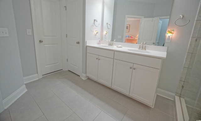 148 Splendor Cir, Murrells Inlet, SC 29576 - full bathroom featuring double vanity, tile patterned flooring, and baseboards
