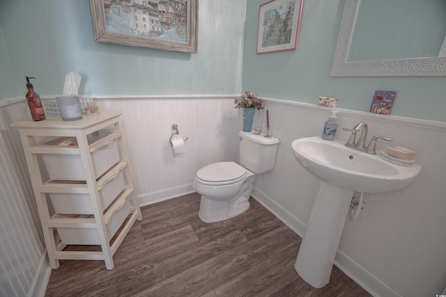 148 Splendor Cir, Murrells Inlet, SC 29576 - half bath with a wainscoted wall, wood finished floors, and toilet