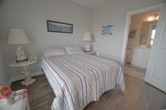 148 Splendor Cir, Murrells Inlet, SC 29576 - bedroom with wood finished floors, ensuite bathroom, and baseboards