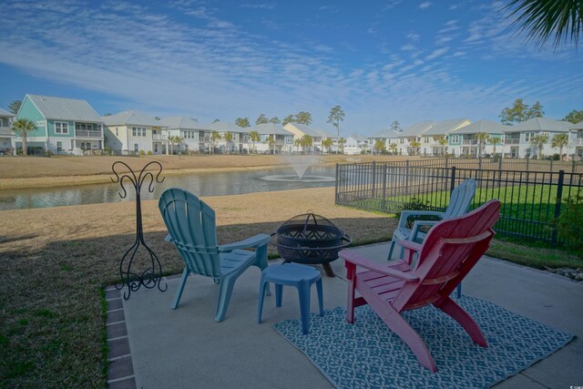 148 Splendor Cir, Murrells Inlet, SC 29576 - view of patio featuring a residential view, an outdoor fire pit, and a water view