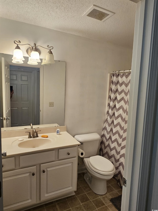 197 Charter Dr Unit D1, Longs, SC 29568 - bathroom featuring toilet, vanity, a textured ceiling, tile patterned flooring, and curtained shower