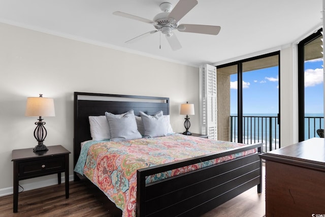 4505 S Ocean Blvd Unit 5D, North Myrtle Beach, SC 29582 - bedroom featuring wood finished floors, access to outside, ornamental molding, a water view, and baseboards