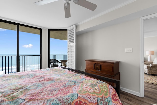 4505 S Ocean Blvd Unit 5D, North Myrtle Beach, SC 29582 - bedroom with wood finished floors, a water view, baseboards, ornamental molding, and access to outside