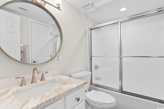 4505 S Ocean Blvd Unit 5D, North Myrtle Beach, SC 29582 - full bath featuring vanity, toilet, enclosed tub / shower combo, and recessed lighting