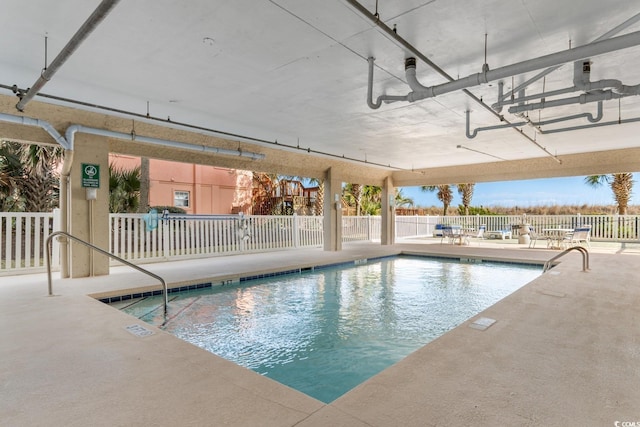 4505 S Ocean Blvd Unit 5D, North Myrtle Beach, SC 29582 - community pool with a patio area