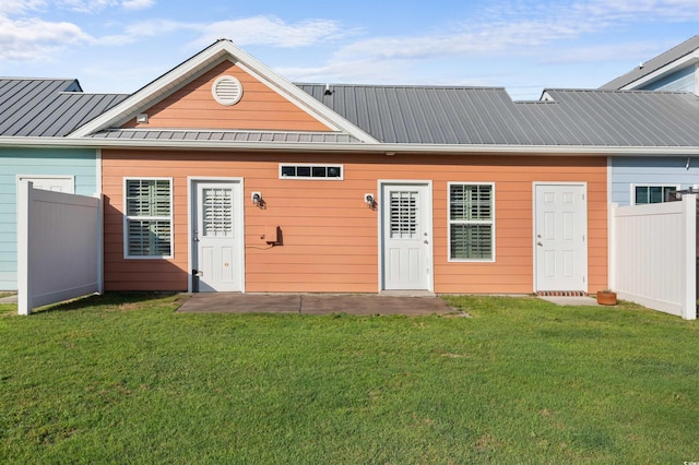 603 Wave Rider Ln Unit 603, North Myrtle Beach, SC 29582 - rear view of property with metal roof and a standing seam roof