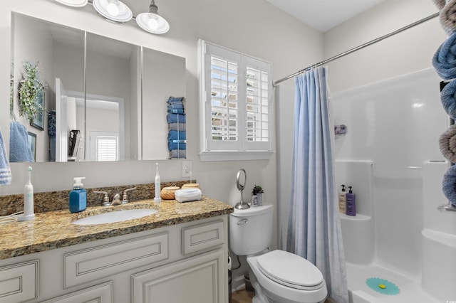 603 Wave Rider Ln Unit 603, North Myrtle Beach, SC 29582 - full bathroom with vanity, curtained shower, and toilet