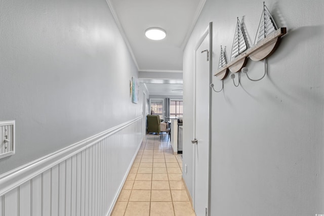 202 N Ocean Blvd Unit 109, North Myrtle Beach, SC 29582 - hallway featuring ornamental molding and light tile patterned floors