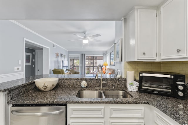 202 N Ocean Blvd Unit 109, North Myrtle Beach, SC 29582 - kitchen featuring a sink, stainless steel dishwasher, ceiling fan, white cabinets, and ornamental molding