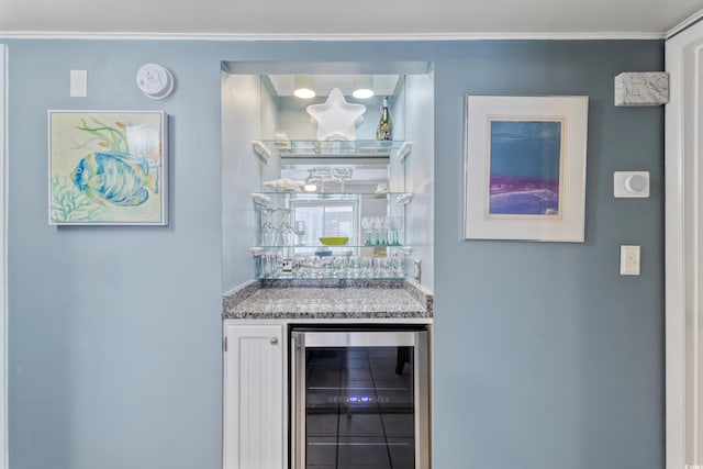 202 N Ocean Blvd Unit 109, North Myrtle Beach, SC 29582 - indoor dry bar featuring wine cooler and ornamental molding
