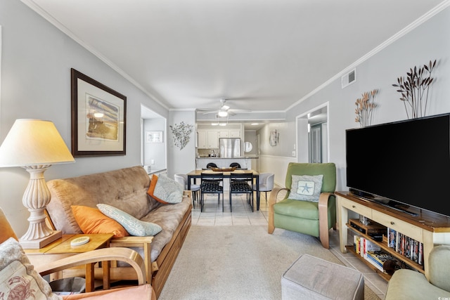 202 N Ocean Blvd Unit 109, North Myrtle Beach, SC 29582 - living room with a ceiling fan, ornamental molding, light tile patterned floors, and light carpet
