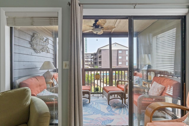 202 N Ocean Blvd Unit 109, North Myrtle Beach, SC 29582 - doorway featuring a ceiling fan and carpet flooring