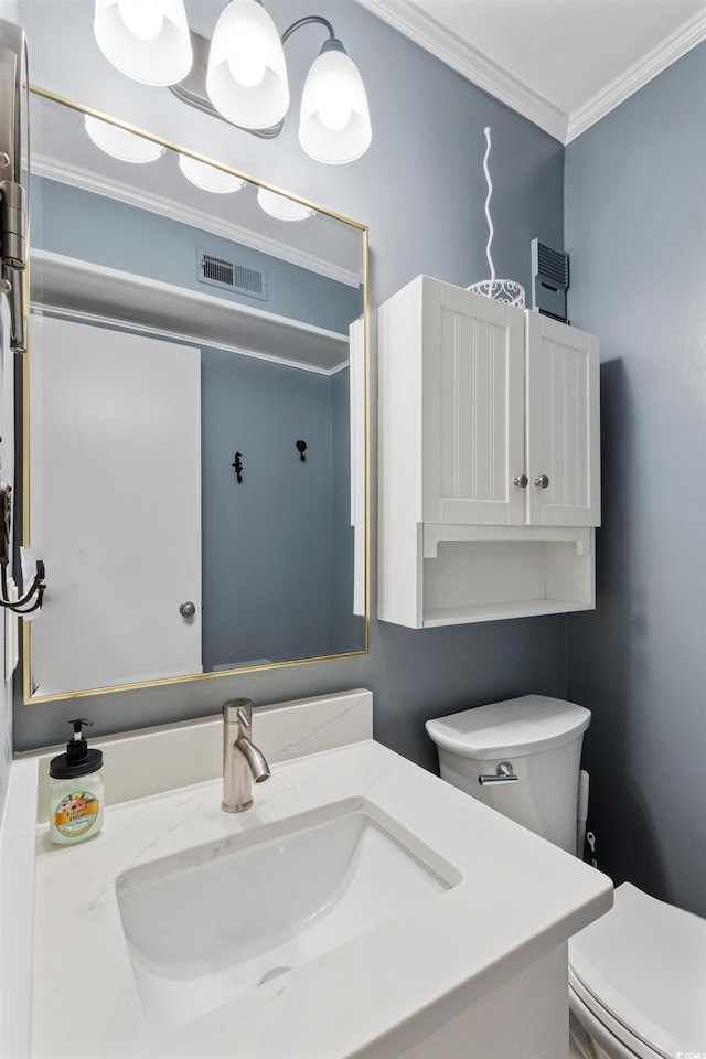 202 N Ocean Blvd Unit 109, North Myrtle Beach, SC 29582 - bathroom featuring toilet, ornamental molding, and vanity