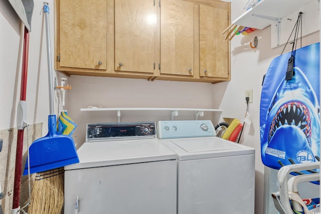 202 N Ocean Blvd Unit 109, North Myrtle Beach, SC 29582 - laundry area with separate washer and dryer and cabinet space