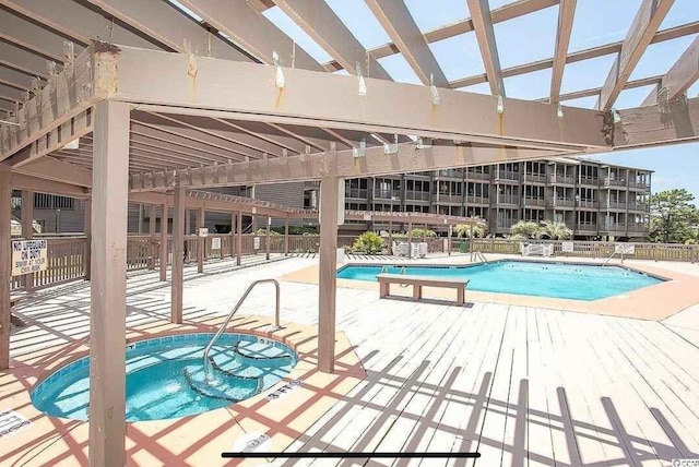 202 N Ocean Blvd Unit 109, North Myrtle Beach, SC 29582 - community pool with a pergola and a patio area