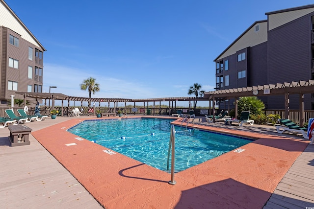202 N Ocean Blvd Unit 109, North Myrtle Beach, SC 29582 - community pool featuring a pergola and a patio