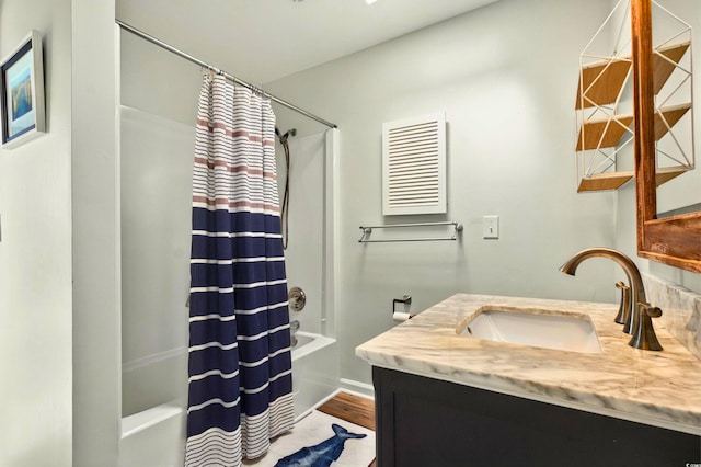 39 Newport St, Ocean Isle Beach, NC 28469 - full bath featuring shower / bath combo, vanity, and wood finished floors