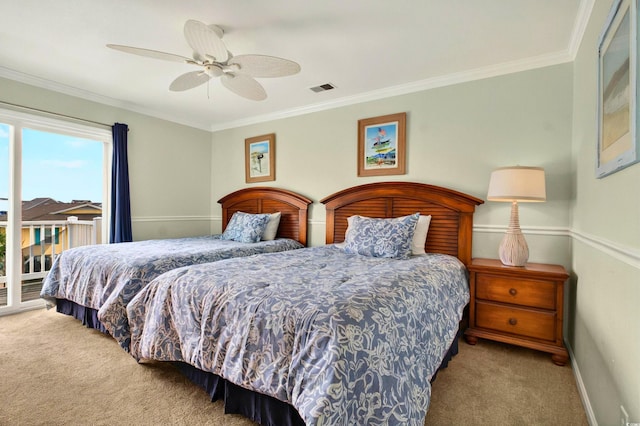 39 Newport St, Ocean Isle Beach, NC 28469 - carpeted bedroom featuring access to exterior, ornamental molding, ceiling fan, and baseboards