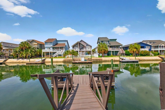 39 Newport St, Ocean Isle Beach, NC 28469 - dock area featuring a residential view and a water view