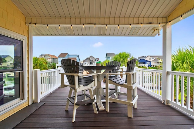 39 Newport St, Ocean Isle Beach, NC 28469 - wooden terrace featuring a residential view