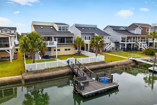 39 Newport St, Ocean Isle Beach, NC 28469 - dock area with a water view and a residential view