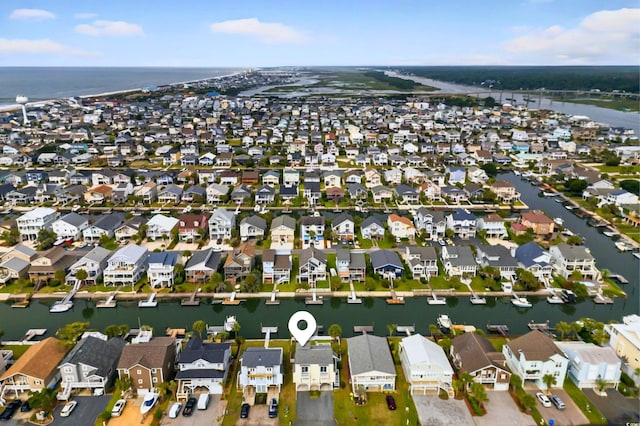 39 Newport St, Ocean Isle Beach, NC 28469 - aerial view of property's location with a large body of water and nearby suburban area