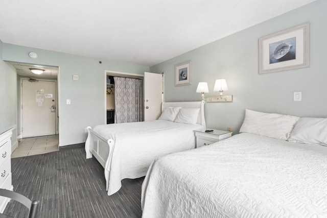 201 74th Ave N Unit 2243/2244, Myrtle Beach, SC 29572 - bedroom featuring a closet and baseboards