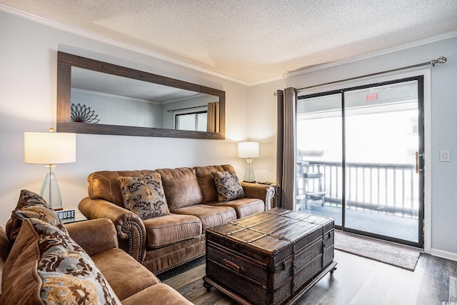 6000 N Ocean Blvd Unit 329, North Myrtle Beach, SC 29582 - living area with ornamental molding, wood finished floors, healthy amount of natural light, a textured ceiling, and baseboards