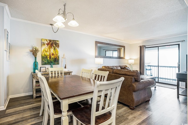 6000 N Ocean Blvd Unit 329, North Myrtle Beach, SC 29582 - dining space featuring a textured ceiling, a chandelier, dark wood-style floors, ornamental molding, and baseboards