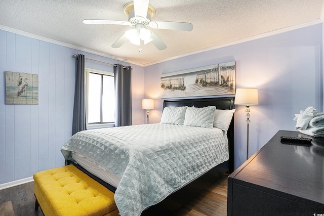 6000 N Ocean Blvd Unit 329, North Myrtle Beach, SC 29582 - bedroom featuring dark wood finished floors, ornamental molding, a textured ceiling, ceiling fan, and baseboards
