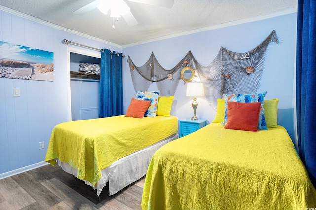 6000 N Ocean Blvd Unit 329, North Myrtle Beach, SC 29582 - bedroom featuring wood finished floors, crown molding, baseboards, and a ceiling fan