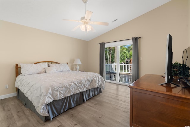 3721 Ed Smith Ave, Myrtle Beach, SC 29588 - bedroom with light wood-style floors, vaulted ceiling, access to outside, baseboards, and a ceiling fan