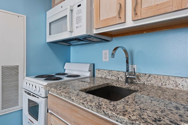 1708 N Ocean Blvd Unit 101, Myrtle Beach, SC 29577 - kitchen featuring white appliances, a sink, light stone countertops, and light brown cabinets