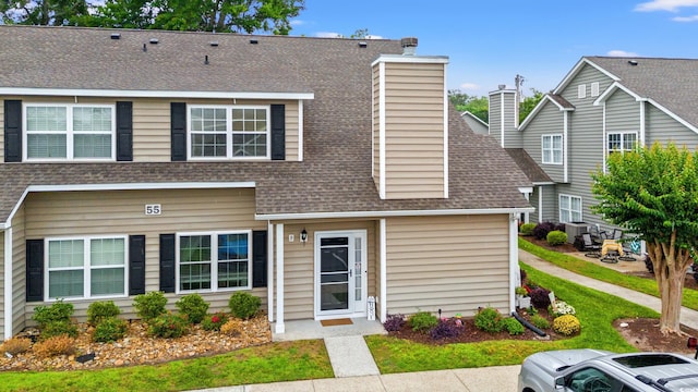 503 20th Ave N Unit 55B, North Myrtle Beach, SC 29582 - multi unit property featuring roof with shingles and a chimney