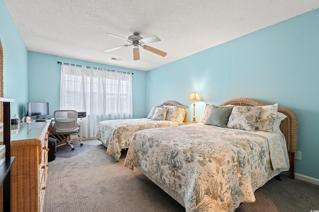 503 20th Ave N Unit 55B, North Myrtle Beach, SC 29582 - carpeted bedroom with an office area, ceiling fan, and a textured ceiling