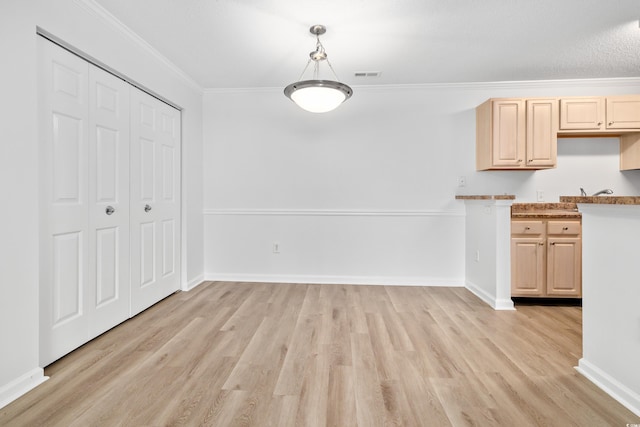 3762 Citation Way Unit 1023, Myrtle Beach, SC 29577 - unfurnished dining area featuring light wood-style floors, crown molding, and baseboards