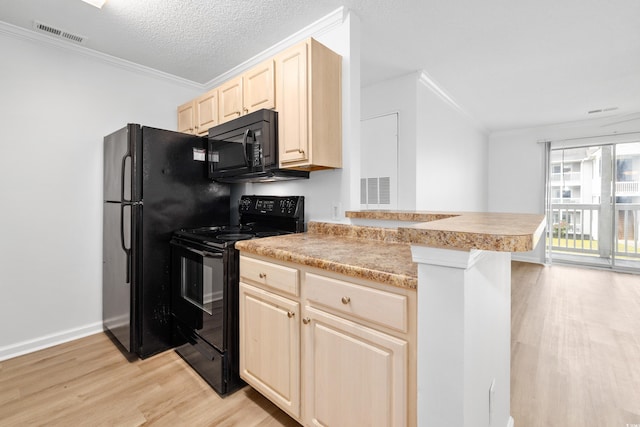 3762 Citation Way Unit 1023, Myrtle Beach, SC 29577 - kitchen featuring black appliances, light wood-style floors, ornamental molding, light brown cabinets, and a peninsula