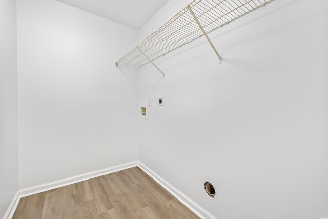 3762 Citation Way Unit 1023, Myrtle Beach, SC 29577 - laundry area with hookup for an electric dryer, wood finished floors, baseboards, and washer hookup