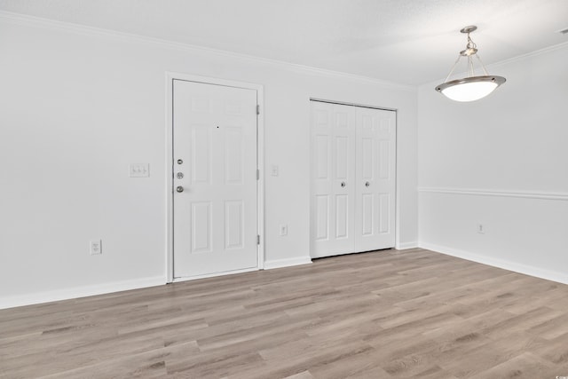 3762 Citation Way Unit 1023, Myrtle Beach, SC 29577 - unfurnished dining area featuring ornamental molding, light wood-style floors, and baseboards