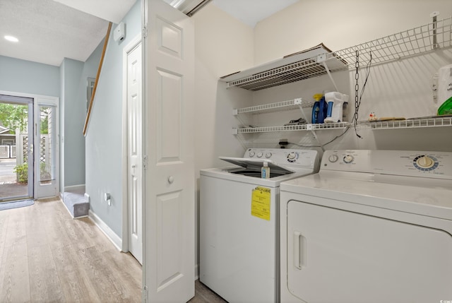 435 Ocean Creek Dr Unit 2722, Myrtle Beach, SC 29572 - laundry area with independent washer and dryer, light wood-style flooring, and baseboards