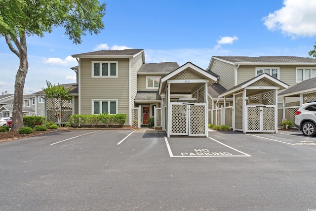 435 Ocean Creek Dr Unit 2722, Myrtle Beach, SC 29572 - view of building exterior featuring uncovered parking