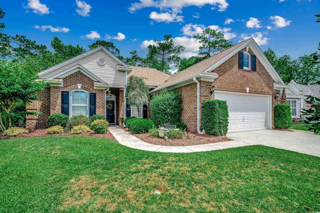 24 Willowbend Dr, Murrells Inlet, SC 29576 - traditional-style home featuring brick siding, driveway, and a front yard